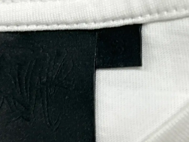 Syna World Tees QC photo 1