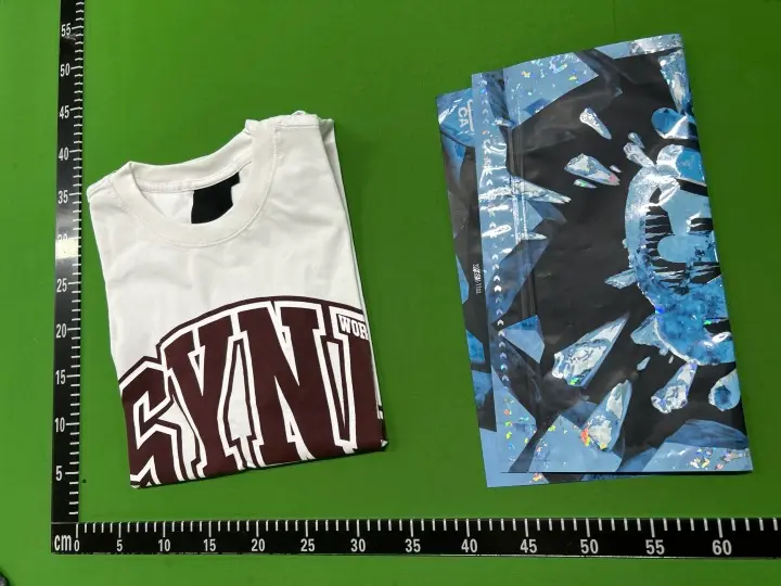 Syna World Tees QC photo 2