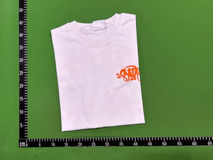 Syna World Tees QC photo 1