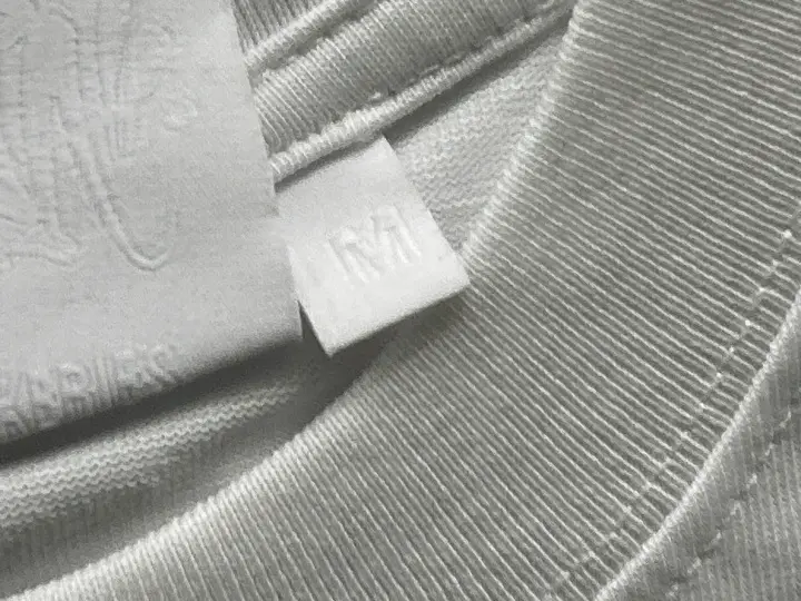 Syna World Tees QC photo 6