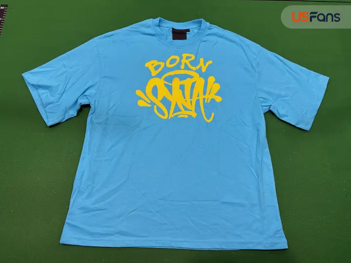 Syna World Tees QC photo 2