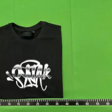 Syna World Tees QC photo