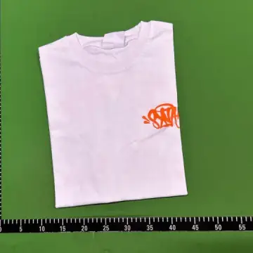 Syna World Tees QC photo